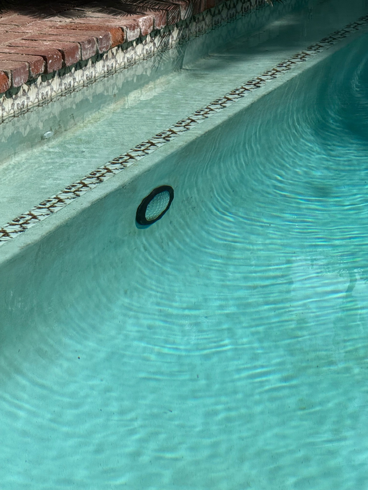 Pool wall light photographed during electrical diagnosis